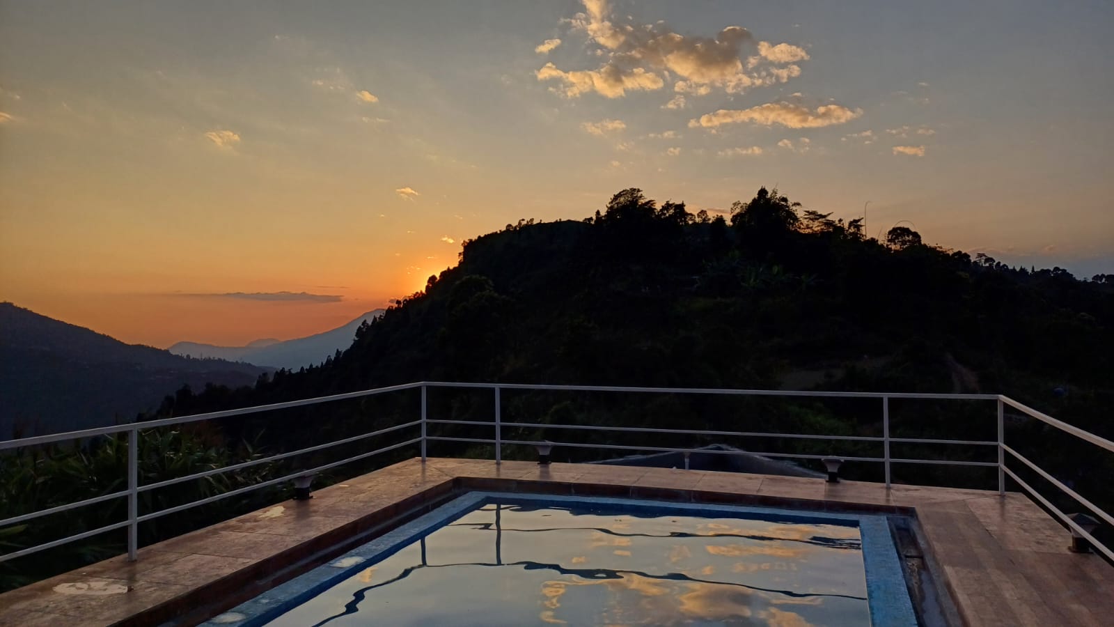 Rooftop pool at sunset