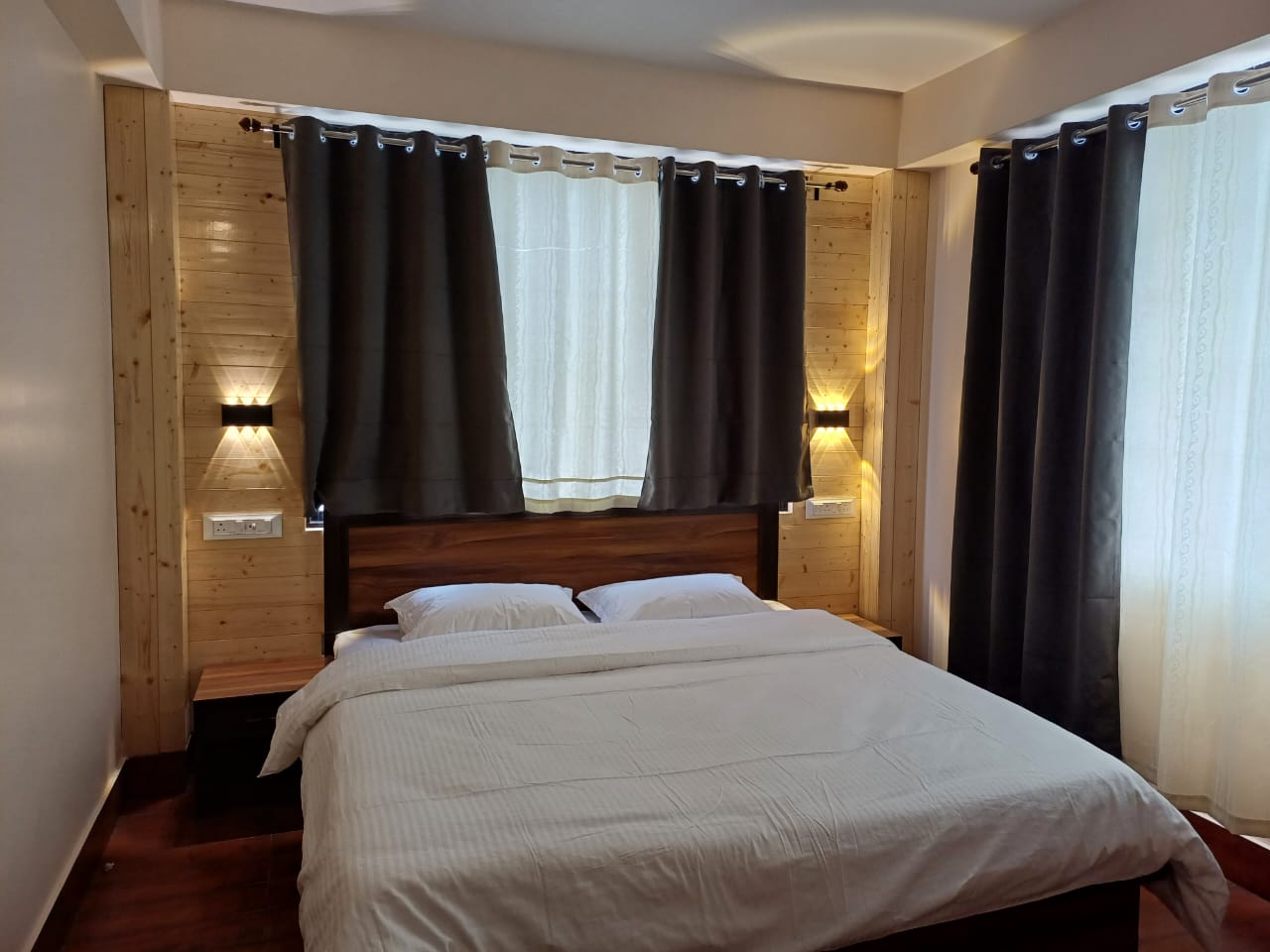 Deluxe room with wood panelling
